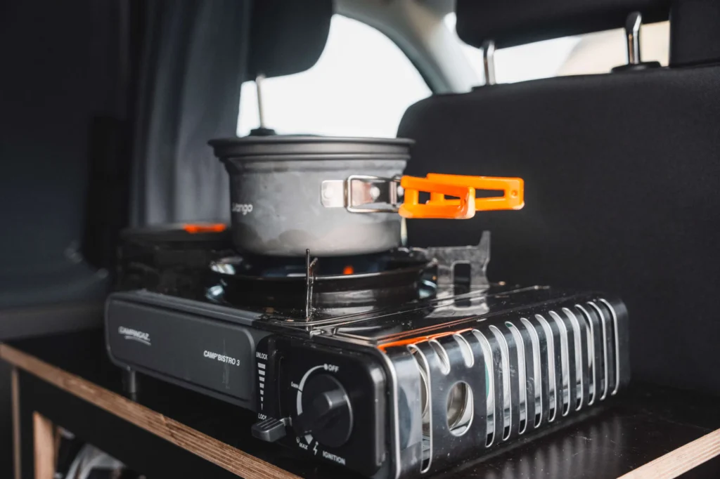 Camper van kitchen with gas stove and equipment, Faroe Islands rental