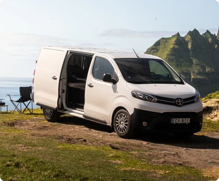 Toyota Proace campervan parked by the ocean in the Faroe Islands – Medium rental for 2–3 people