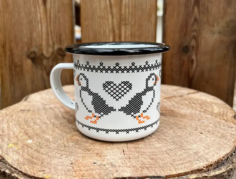 Travel cup and kitchenette gear in camper van, Faroe Islands